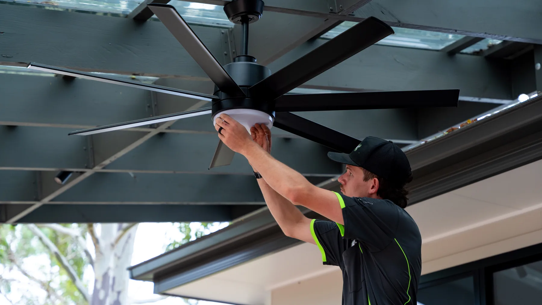 Outdoor pergola fan installed above a patio